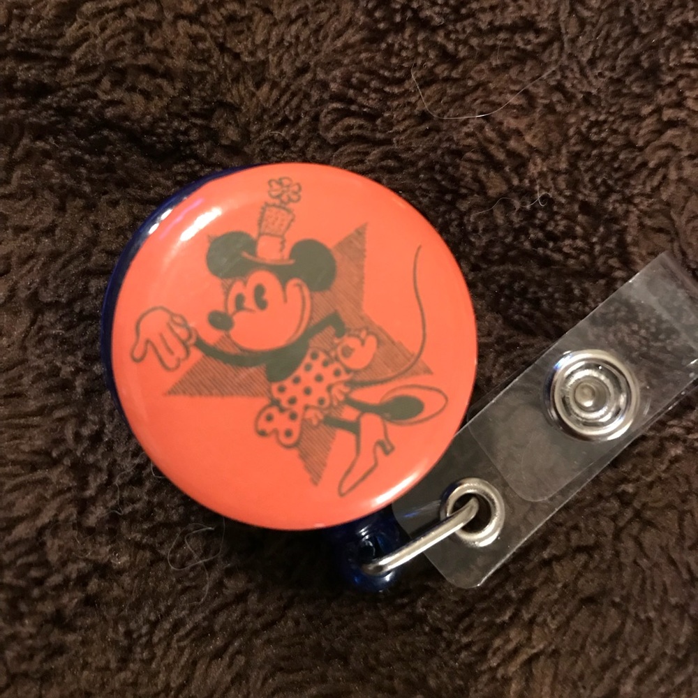 Minnie Mouse in a star ⭐️ badge reel